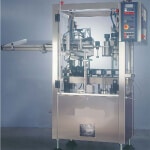This is a photo of a bottle capsuling machine