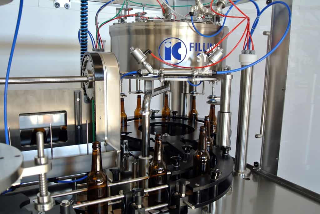 It is a graphic of Striking Wine Bottle Label Remover Machine It is a graphic of Striking Wine Bottle Label Remover Machine