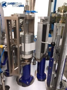 Reel fed labelling station