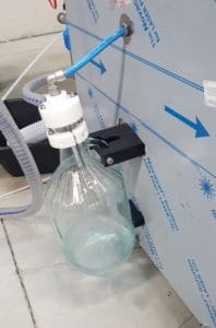 Visible alarm for vacuum pump fill